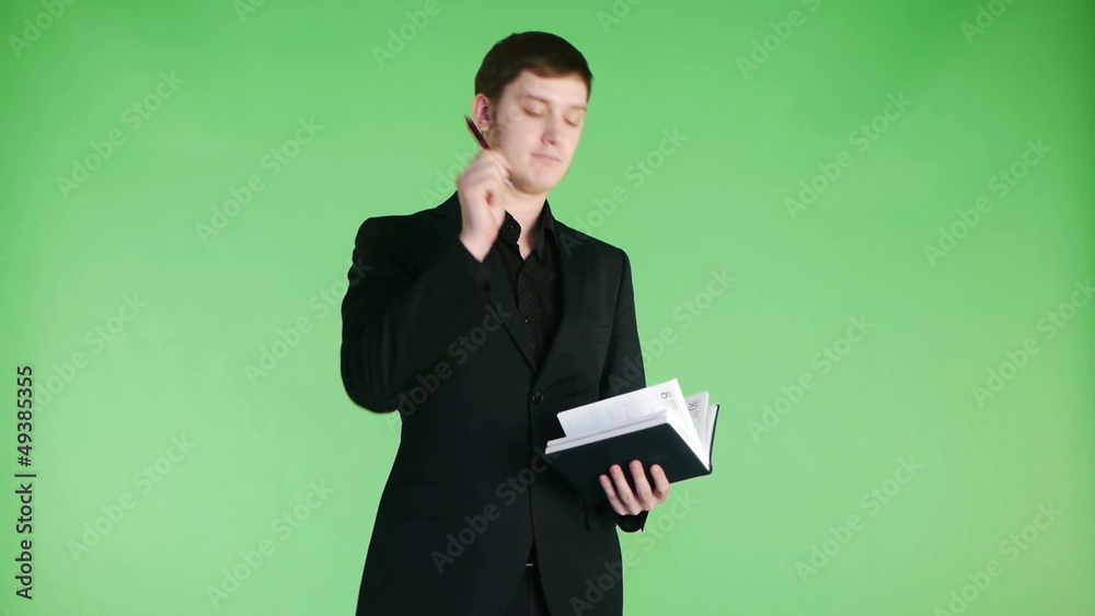 young businessman workning with his business organizer young businessman workning with his business organizer