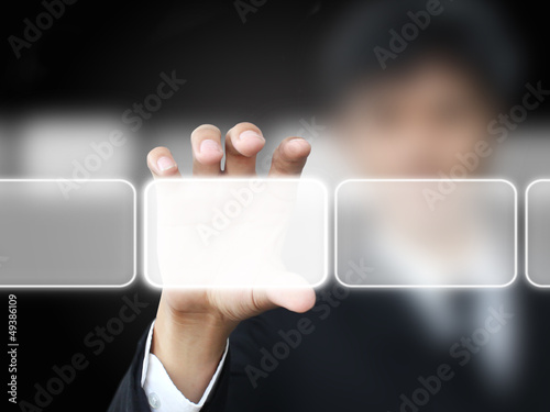 Business man holding touch screen