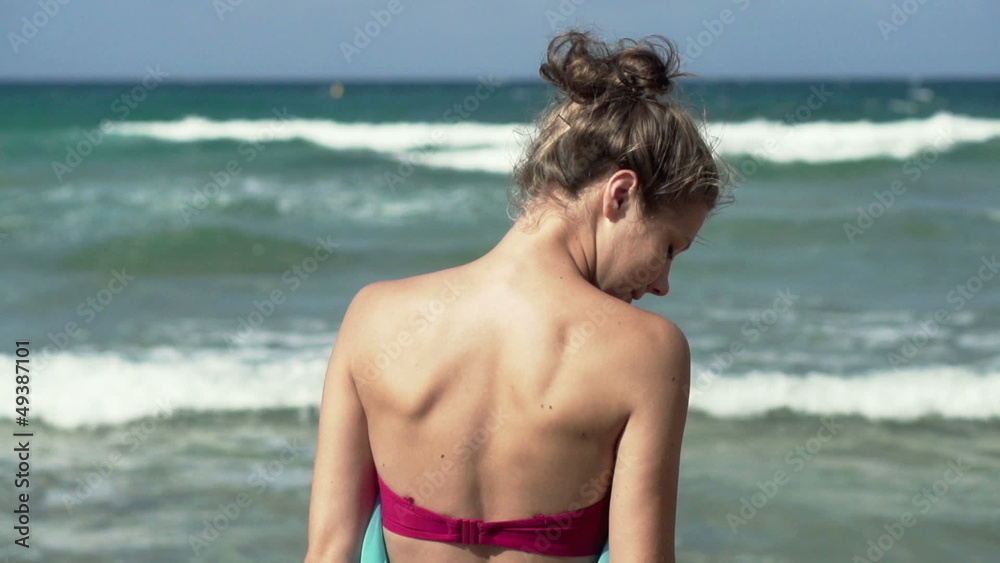 Sexy woman standing by the sea, super slow motion Sexy woman standing by the sea, super slow motion