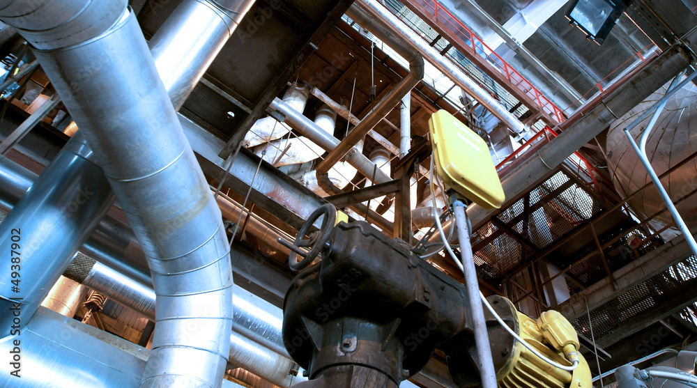 Industrial zone, Steel pipelines and cables in blue tones Industrial zone, Steel pipelines and cables in blue tones