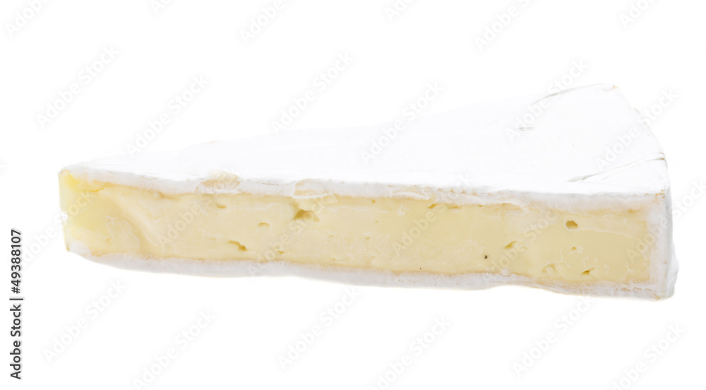 A piece of soft brie cheese