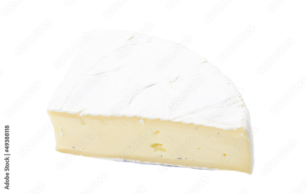 A piece of soft brie cheese