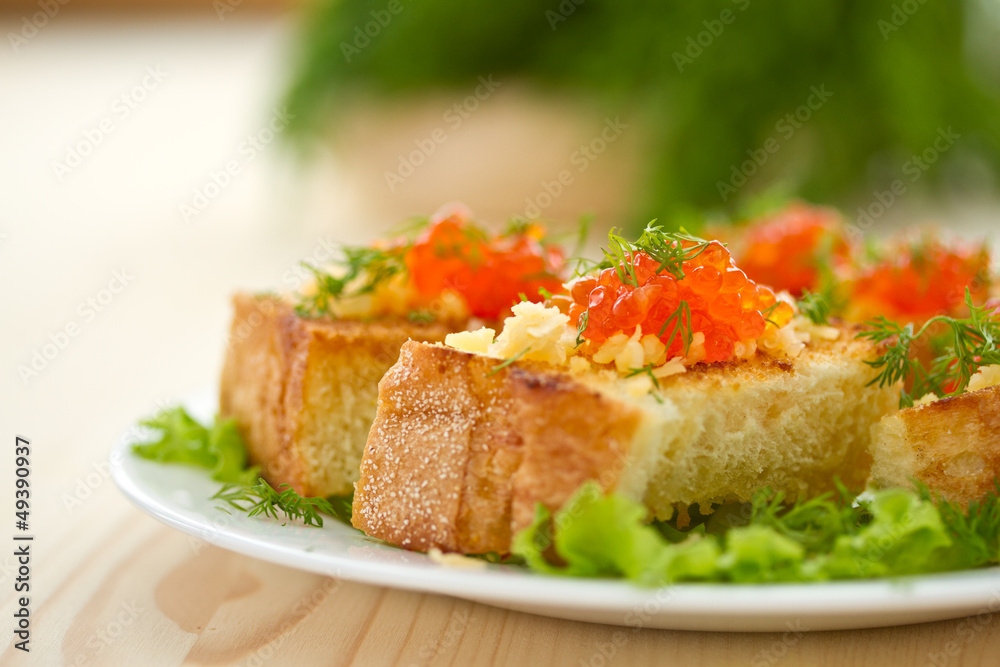 Fried toast with cheese and red caviar Fried toast with cheese and red caviar