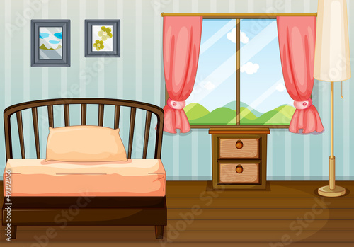 A bed, a lamp and a side table