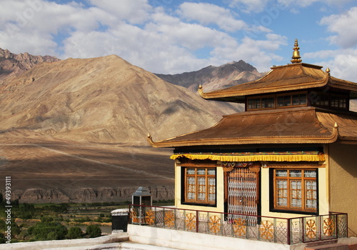 Beautiful scenic view of medieval Spituk gompa (Buddhist monastery) at the background of barren mountain range in Leh district, Ladakh, Himalayas, Jammu and Kashmir, Northern India, Central Asia photo