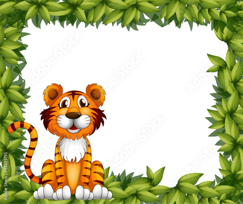 A tiger sitting in a leafy frame