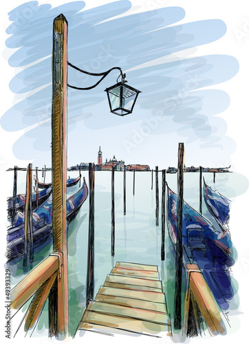 Venice. Street lamp and gondolas on the water