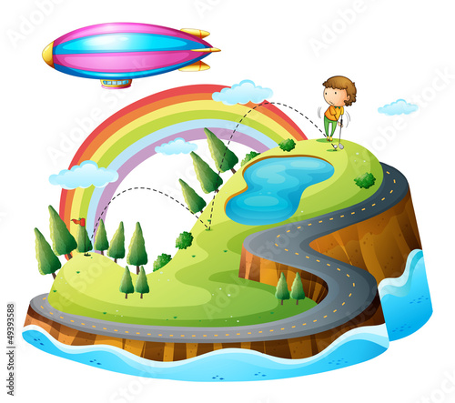 A boy playing golf and a blimp