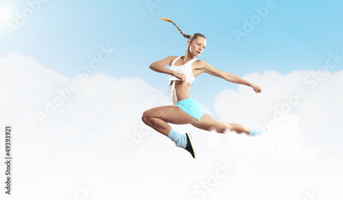 Image of sport woman jumping