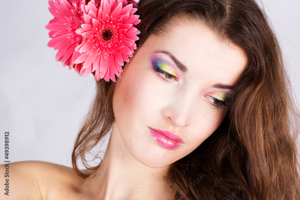 Girl with gerbera flower in studio Girl with gerbera flower in studio