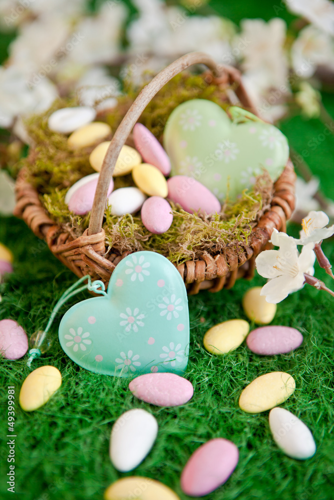 Fototapeta premium Easter nest with easter nest on green