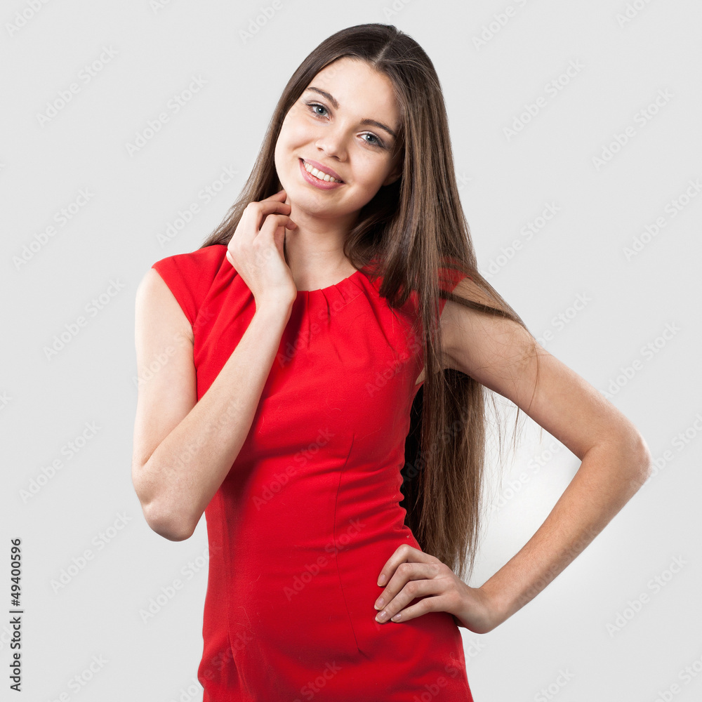 Beautiful smiling woman in red dress Beautiful smiling woman in red dress