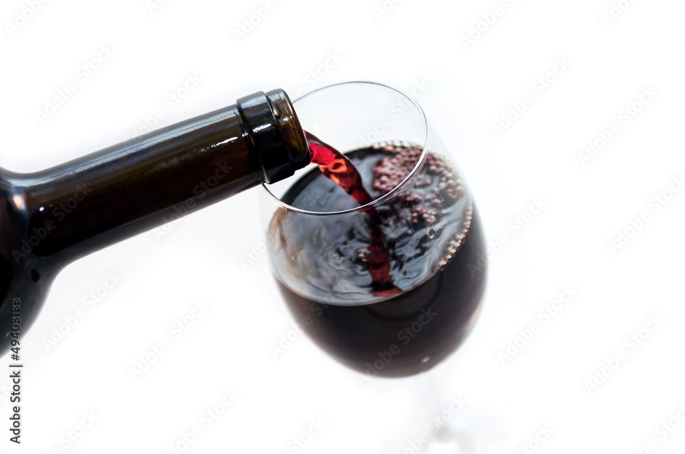 Fototapeta premium Pouring wine into a glass .