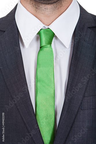 Businessman wearing green tie