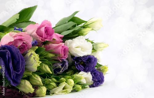 Bouquet of blue,pink and white flowers with diffused background.