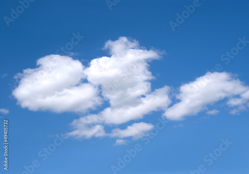 Landscape with white clouds on blue sky as background