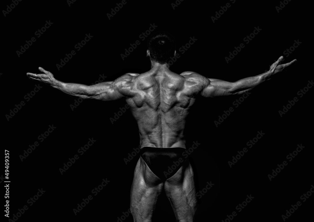 Fit male model showing his back