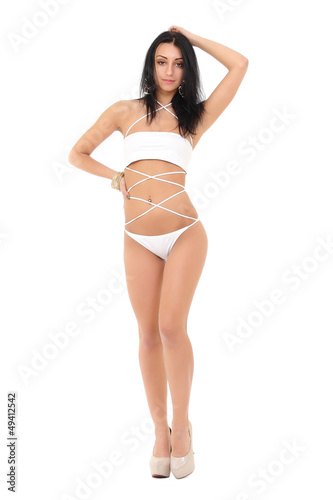 girl in a white bathing suit on a white background