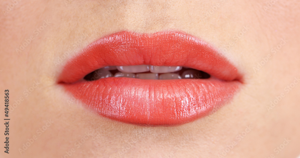 Fototapeta premium beautiful make up of gloss lips, close up