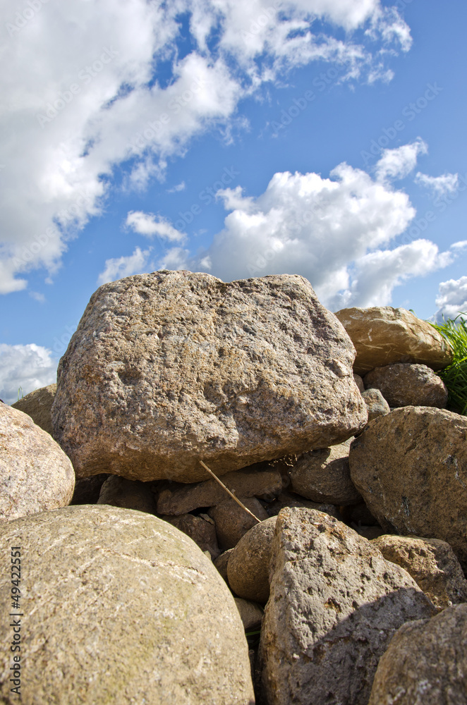 natural stones on field and sky natural stones on field and sky