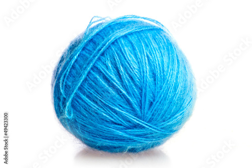 blue ball of woolen threads on a white background