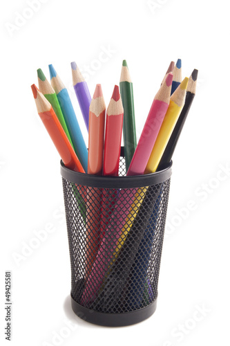 Color pencils in metal vase