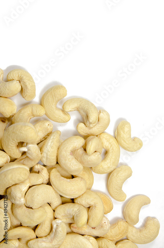 Raw cashew nuts isolated on white background