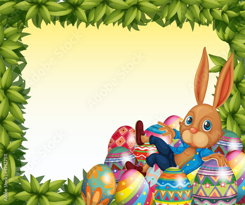 A male bunny in a leafy frame border