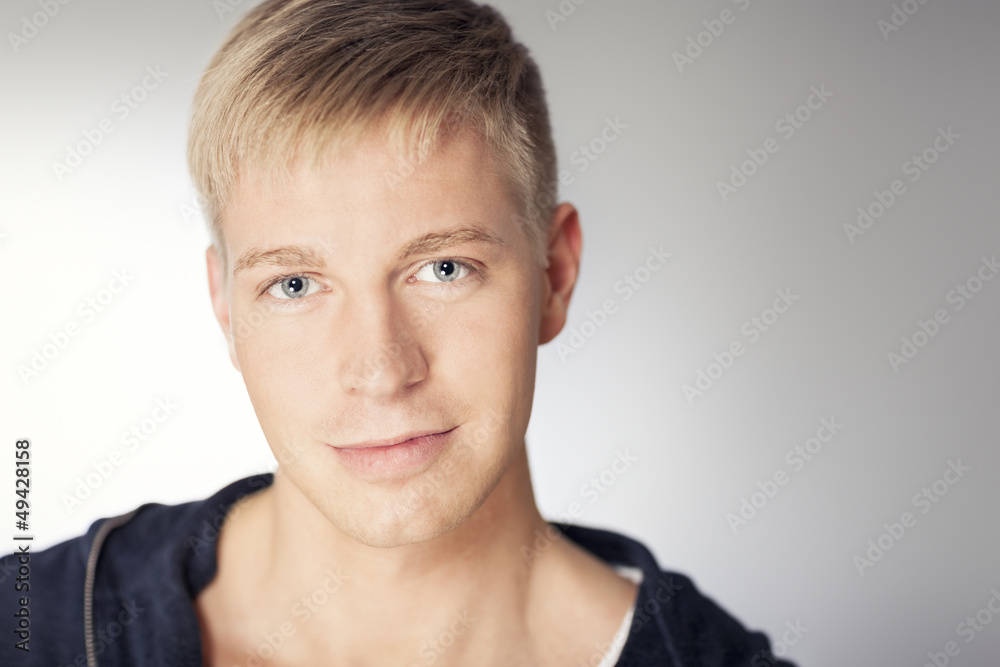 Close up of handsome man with charming calm look. Close up of handsome man with charming calm look.