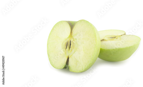 two halves of green apple isolated on white background
