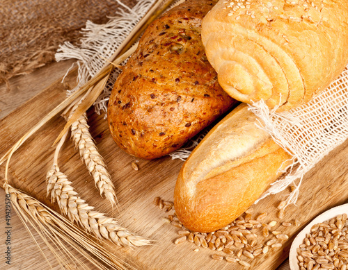 Fresh baked traditional bread and wheat
