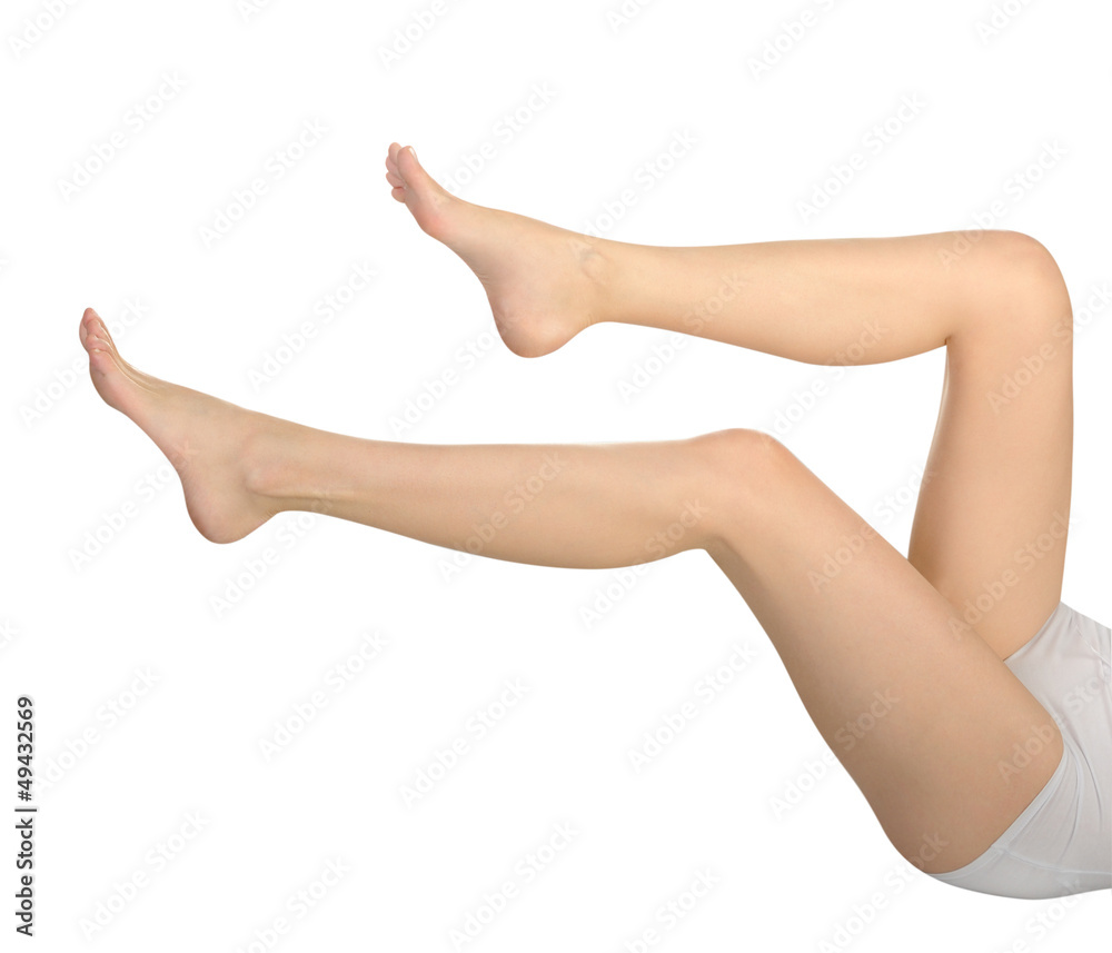 Beautiful woman legs isolated on white background Beautiful woman legs isolated on white background