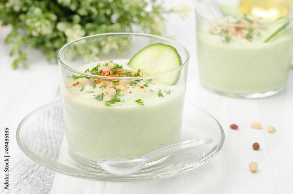 cold soup with avocado, cucumber and yogurt in a glass beaker cold soup with avocado, cucumber and yogurt in a glass beaker