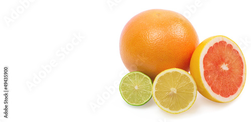 Image of a fresh whole lime  lemon and orange isolated on white