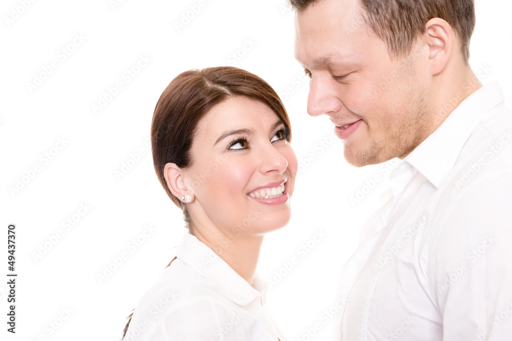 Young and happy couple in front of white background Young and happy couple in front of white background