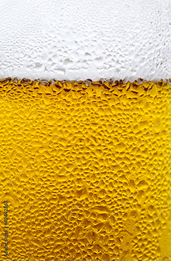 Condensation Drops on a Glass of Cold Beer Condensation Drops on a Glass of Cold Beer