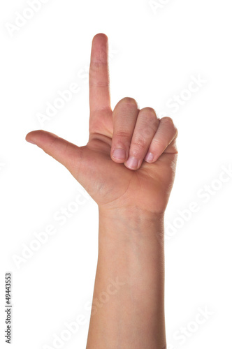 Child hands showing two fingers