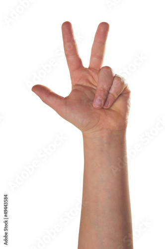 Child hand showing three fingers