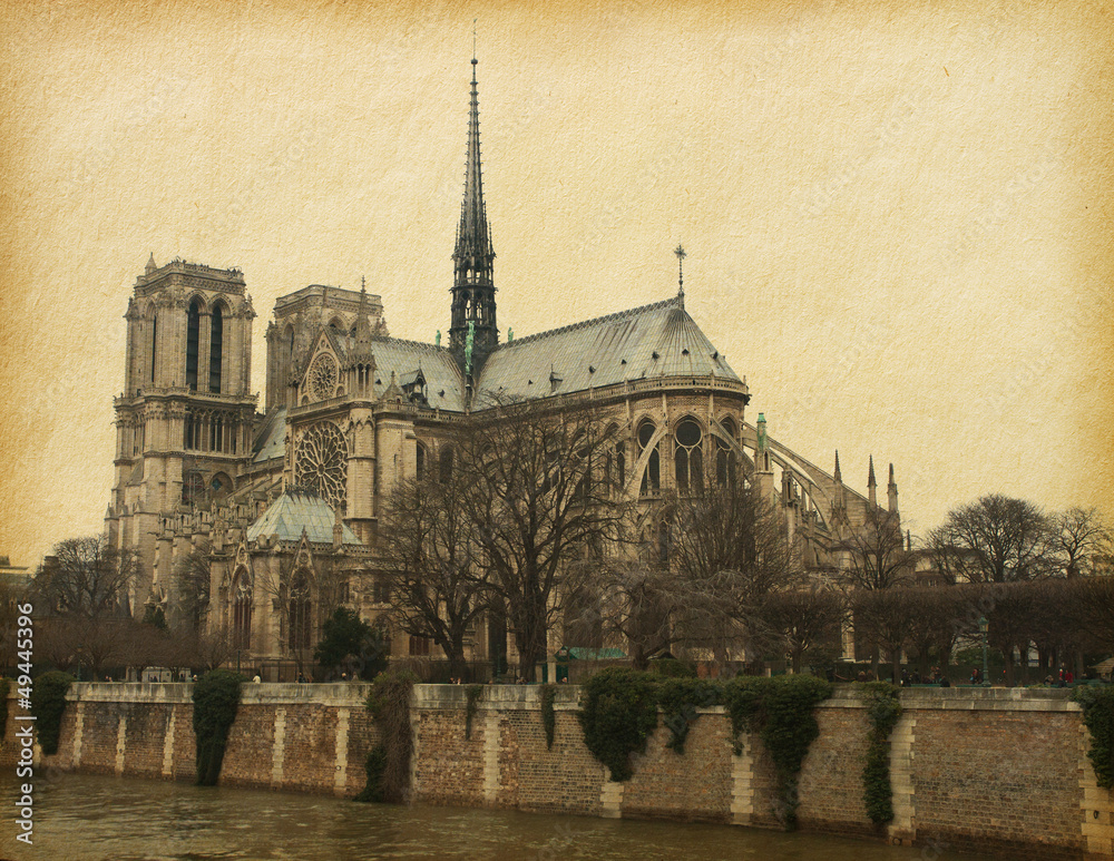 Notre Dame de Paris. Photo in retro style. Paper texture.
