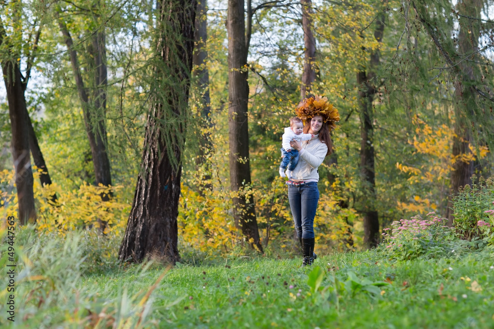 Young mother playing with her baby daughter Young mother playing with her baby daughter