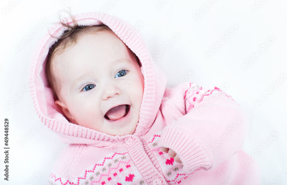 Laughing baby girl knitted pink sweater red hearts Laughing baby girl knitted pink sweater red hearts
