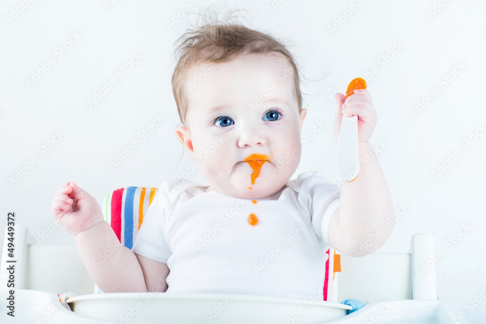 Adorable baby girl eating vegetables for the first time Adorable baby girl eating vegetables for the first time
