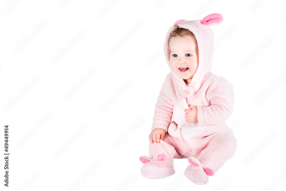 Funny baby in a bunny custom, isolated on white