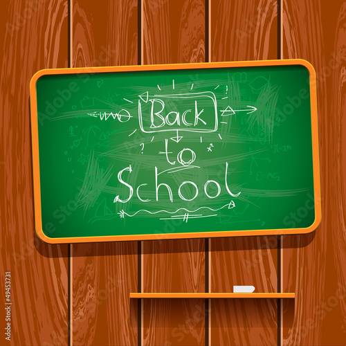 Back to school, chalkwriting on blackboard, vector Eps10 image. photo