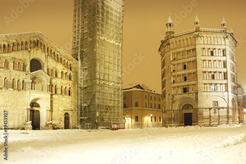 Baptistery and Cathedral at night with snow photo