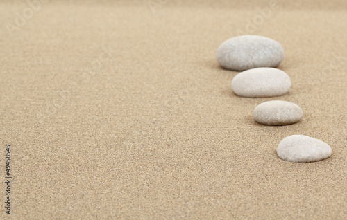 zen stones in sand