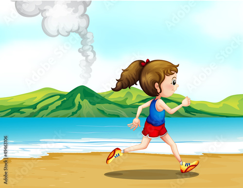 A girl jogging at the seashore