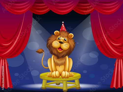 A lion sitting above a round table