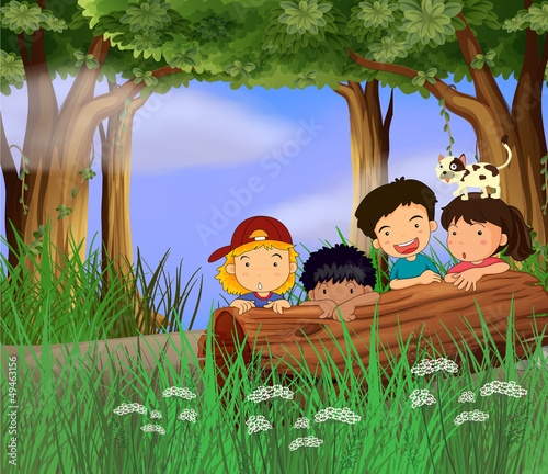 Four childrens playing in the forest