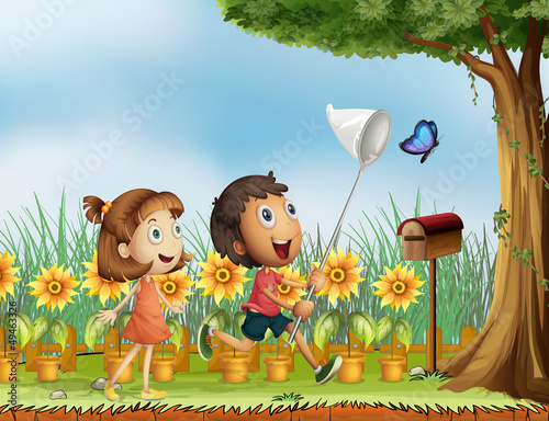 Children trying to catch a butterfly